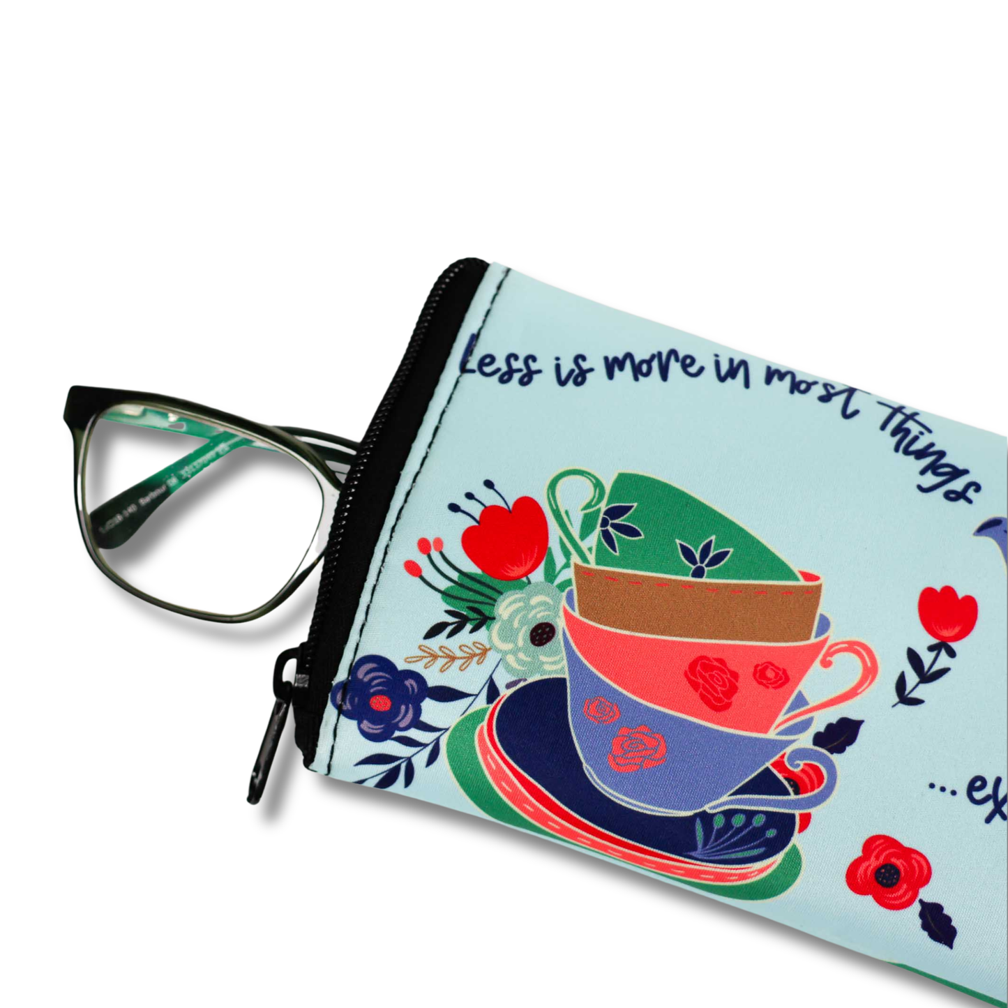 Eyeglasses on a floral and teacup design pouch with text.