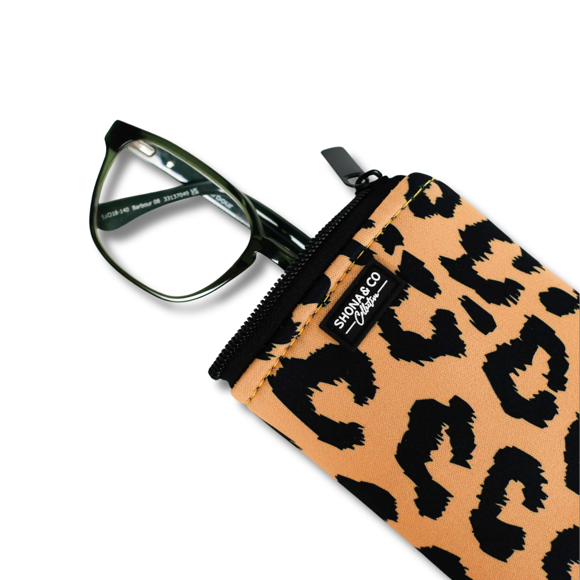 Leopard print glasses case with a pair of glasses on a white background